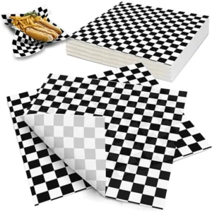 Papel antigrasa blanco y negro 28x34 cm. Ideal para envolver alimentos grasos. Pack de 100 unidades. Perfecto para locales de comida rápida.