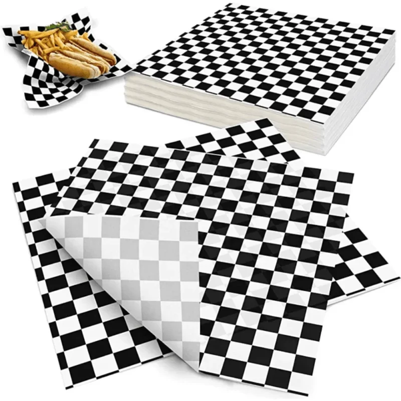 Papel antigrasa blanco y negro 28x34 cm. Ideal para envolver alimentos grasos. Pack de 100 unidades. Perfecto para locales de comida rápida.